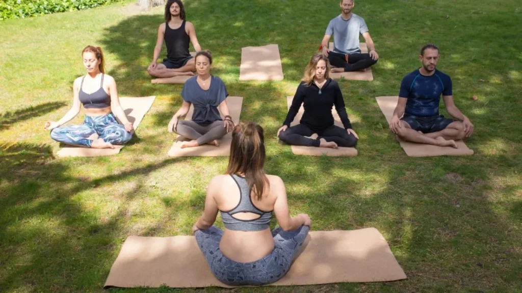 womens doing yoga retreat