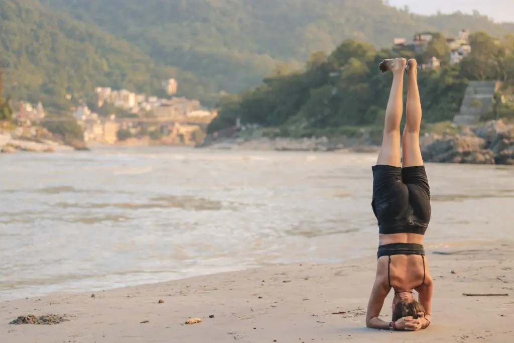 women performing yoga